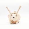Plush toy hedgehog with long ears on a white background
