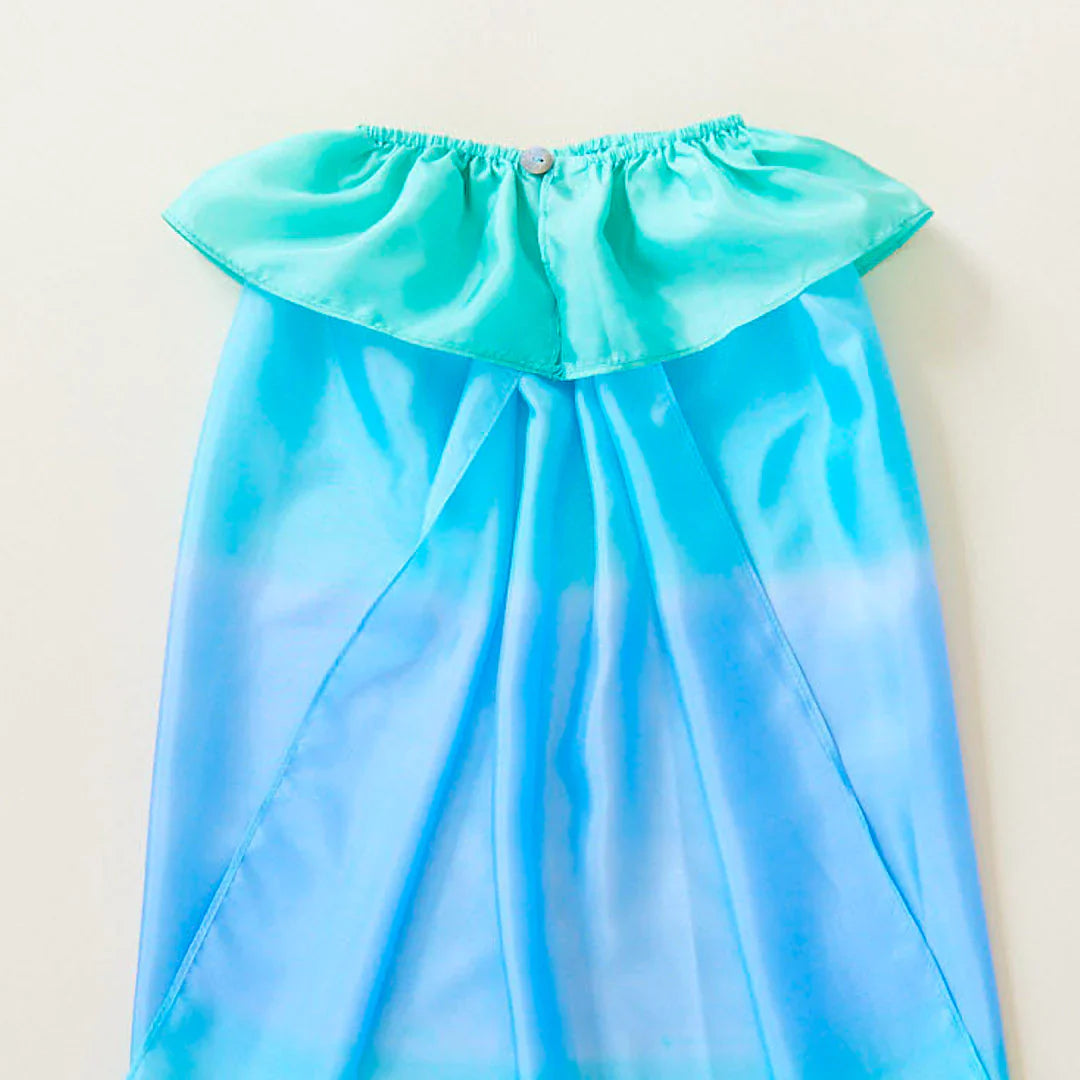 Blue and green gradient dress on a white background