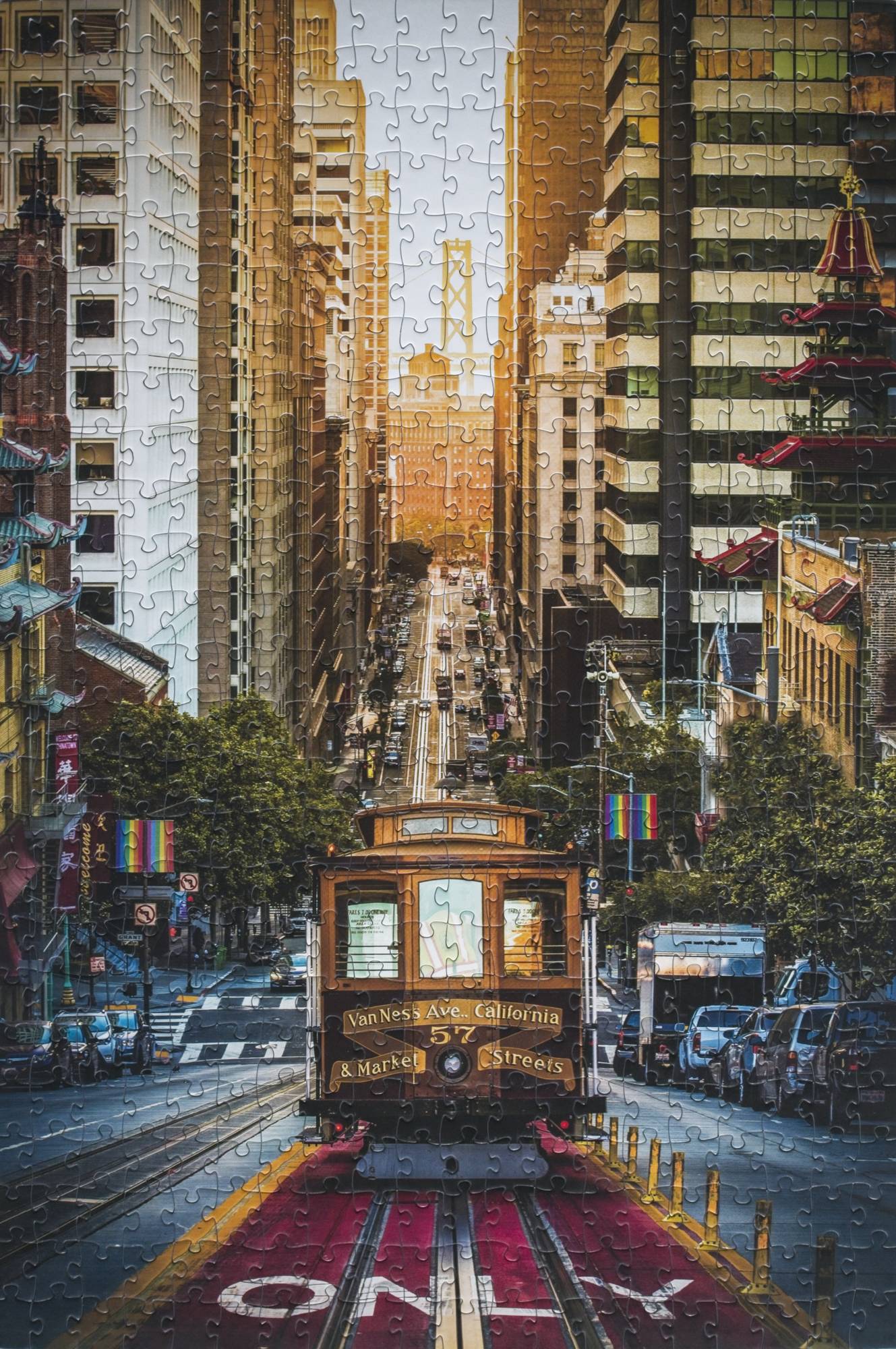 Completed California St Cable Car 500-piece jigsaw puzzle showing a San Francisco street view by Emanuel DeSousa