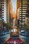 Completed California St Cable Car 500-piece jigsaw puzzle showing a San Francisco street view by Emanuel DeSousa