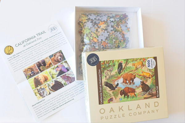 California Trail Oakland Zoo jigsaw puzzle box open with puzzle pieces