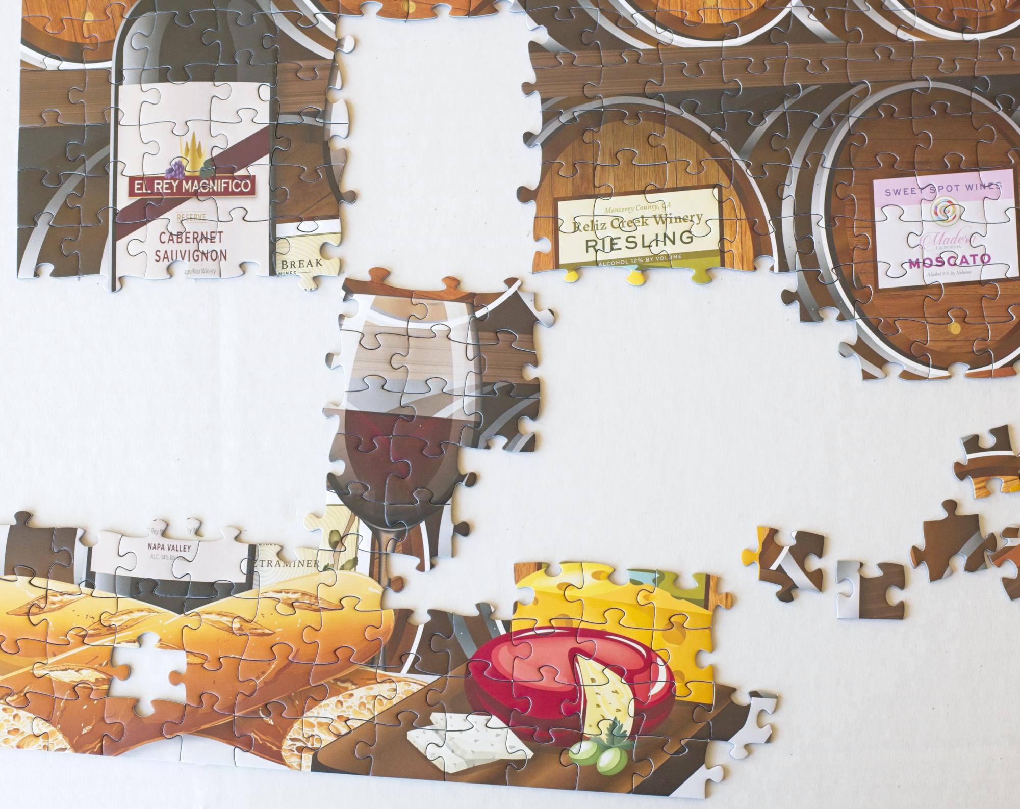 California Wine Tasting puzzle partially assembled on a table