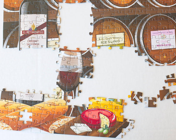 California Wine Tasting puzzle partially assembled on a table