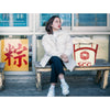 Lifestyle shot of HHPLIFT recycled cement bag tote — sustainable everyday tote supporting women in Cambodia
