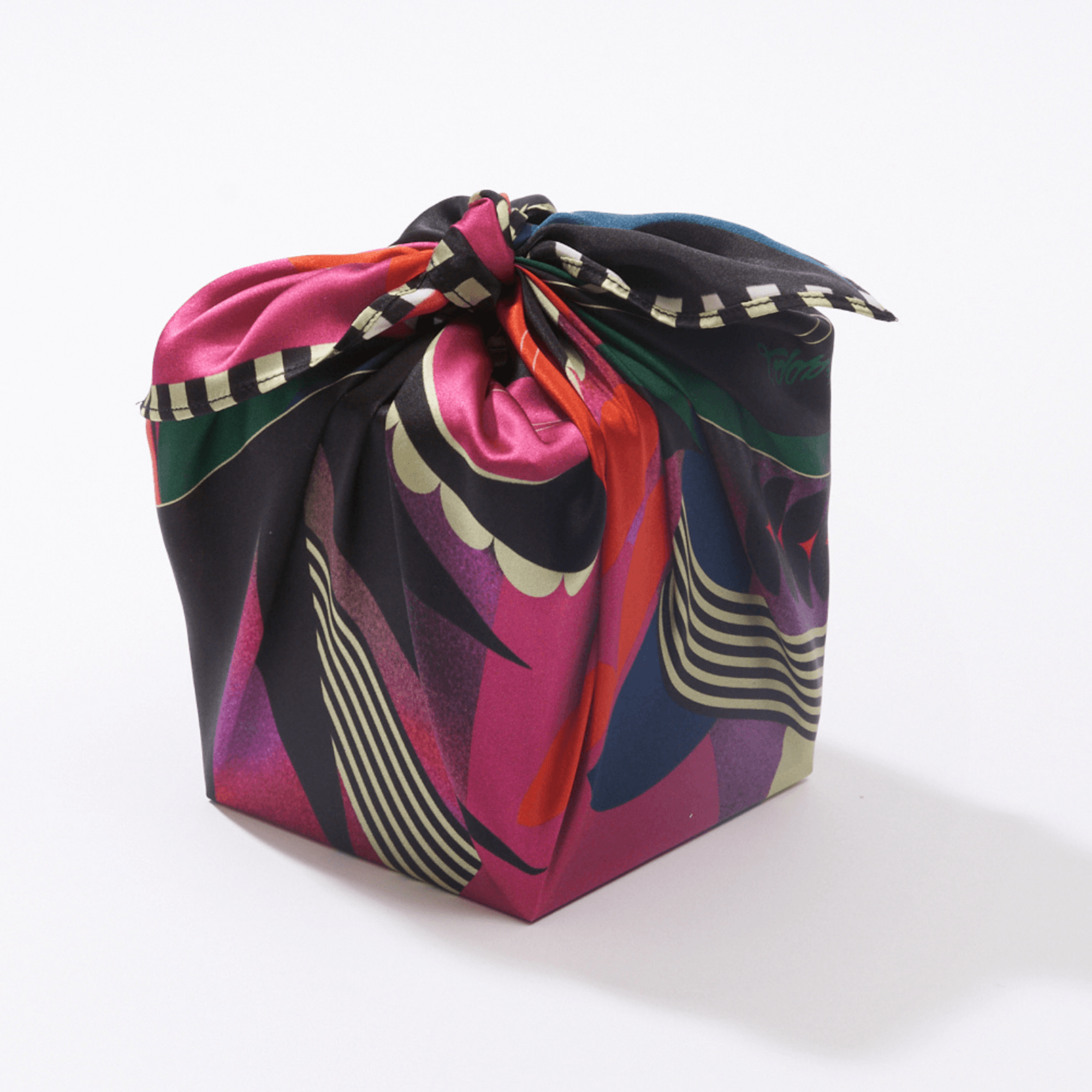 Chalice reusable silk furoshiki wrap by Essery Waller styled as eco-friendly gift wrapping – close-up of print detail