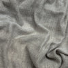 Close-up of gray fabric with a subtle pattern