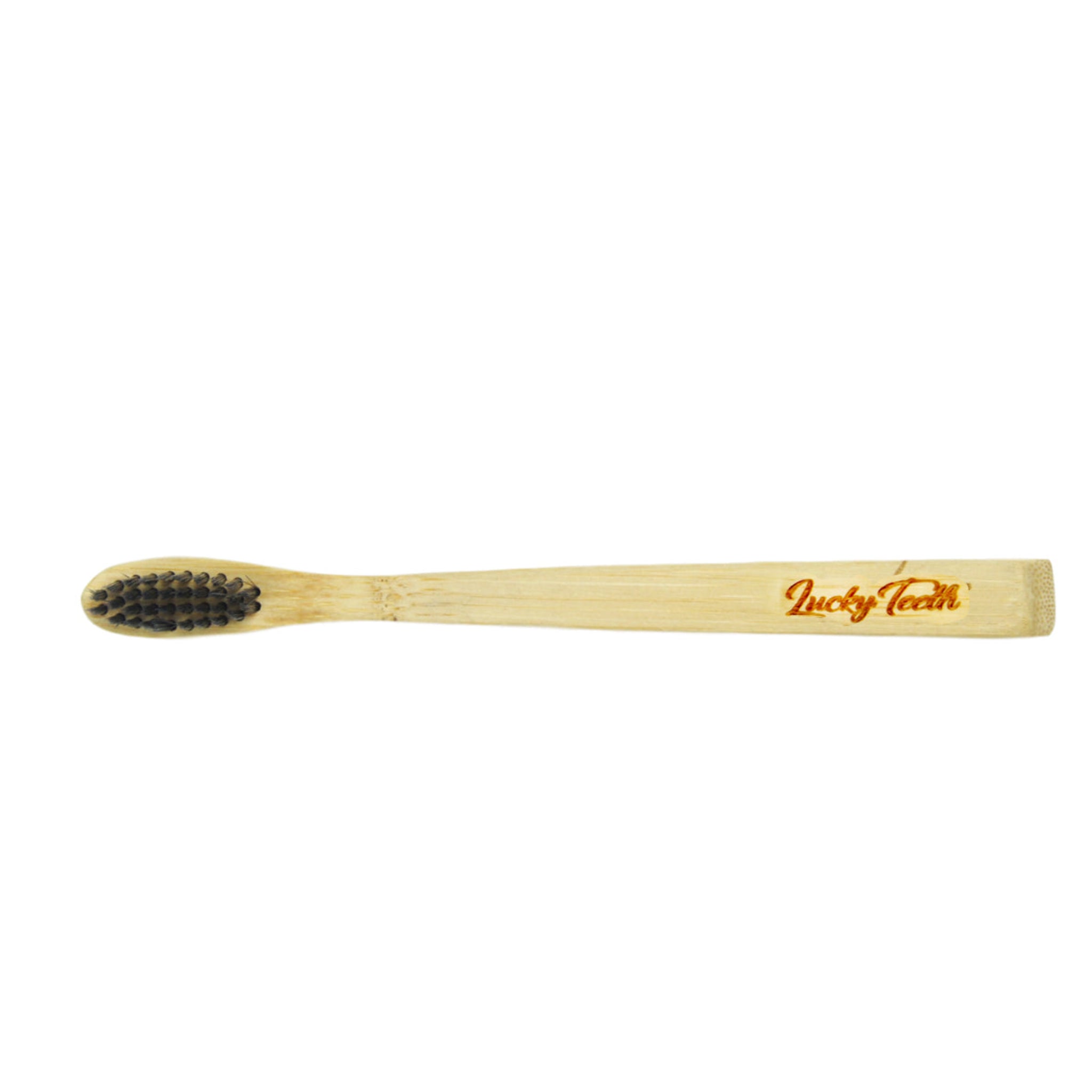 Bamboo toothbrush with black bristles on a white background