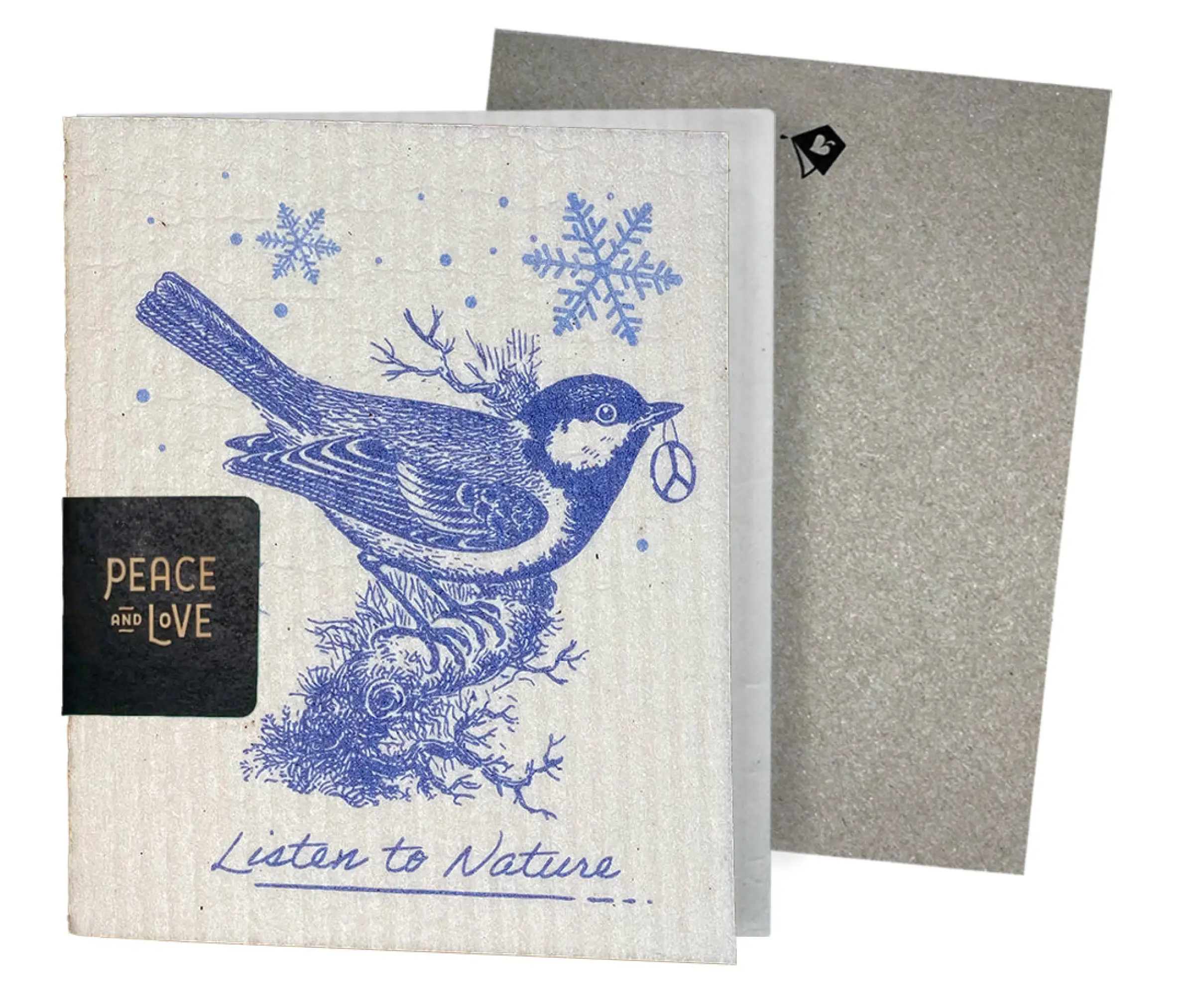A greeting card with a vintage etching of a bird and snowflakes design, accompanied by text that reads 'PEACE LOVE' and 'Listen to Nature'. The card is part of a eco-friendly product line.