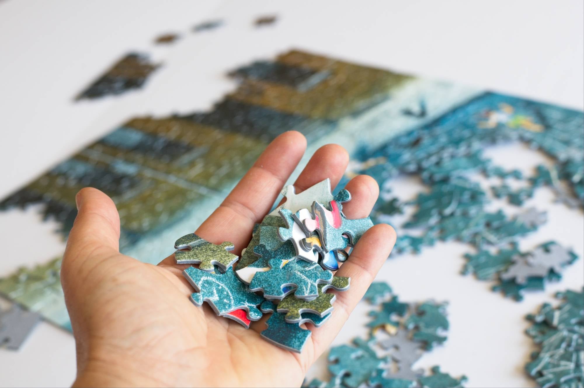 Close-up of Children's Games jigsaw puzzle pieces from Oakland Puzzle Company