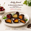 Assorted chocolate covered fruits including cherry, pear, pumpkin, orange, peach and orange peel