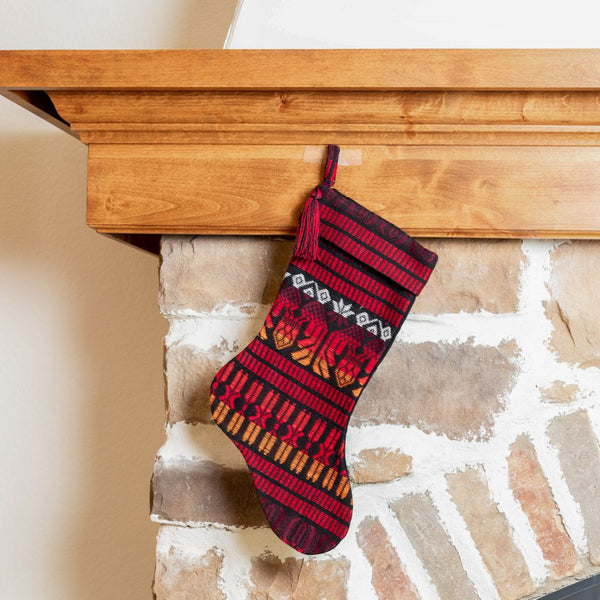 Add a touch of global elegance to your holiday decor with our handcrafted Guatemalan Brocade Christmas Stocking. Made from sustainable materials and featuring intricate patterns, this stocking is perfect for any home. Order yours today!