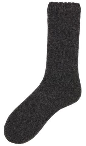 Dark gray sock on a white background. Classic Alpaca Socks – soft, breathable, and versatile for year-round wear. Ethically made in Peru. Shop timeless alpaca comfort today.