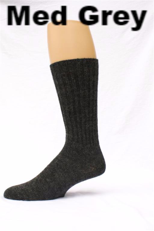 Knee-high sock on a mannequin leg with 'Med Grey' text above. Classic Alpaca Socks – soft, breathable, and versatile for year-round wear. Ethically made in Peru. Shop timeless alpaca comfort today.