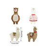 Four plush toys resembling llamas with decorative scarves on a white background