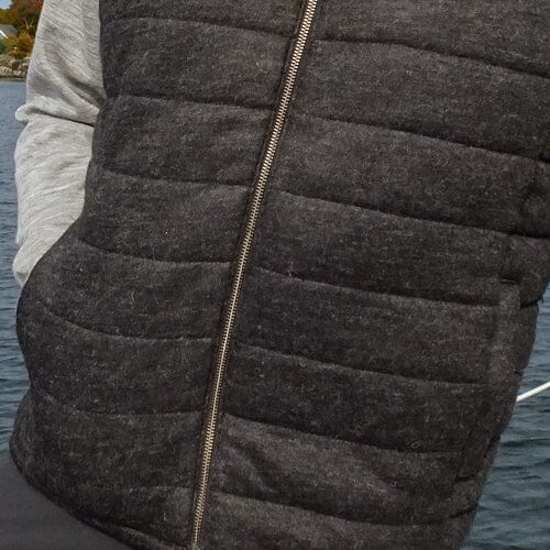 Stay warm and stylish this winter with our Men's Alpaca Vest. This luxurious vest is perfect for layering and keeping you cozy all winter long.