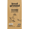 Close-up of Level Ground Colombian Dark Roast Coffee packaging showing tasting notes of citrus, dark chocolate, and sweet spice