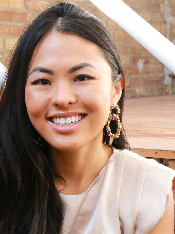 Colorful handmade beaded earrings from Fair Anita's Peru Collection on display