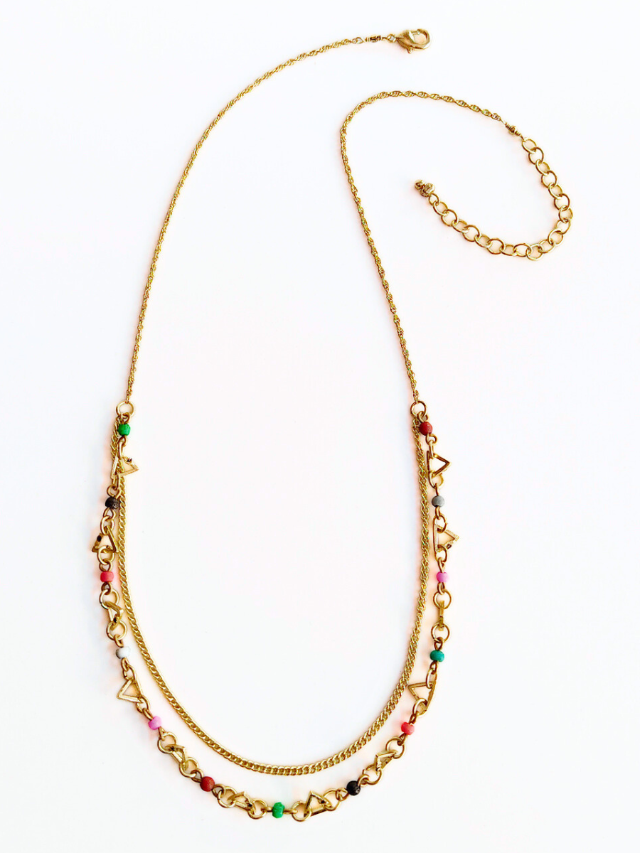 Close-up of Confetti Dual Strand Necklace showing gold-plated recycled brass chain detail