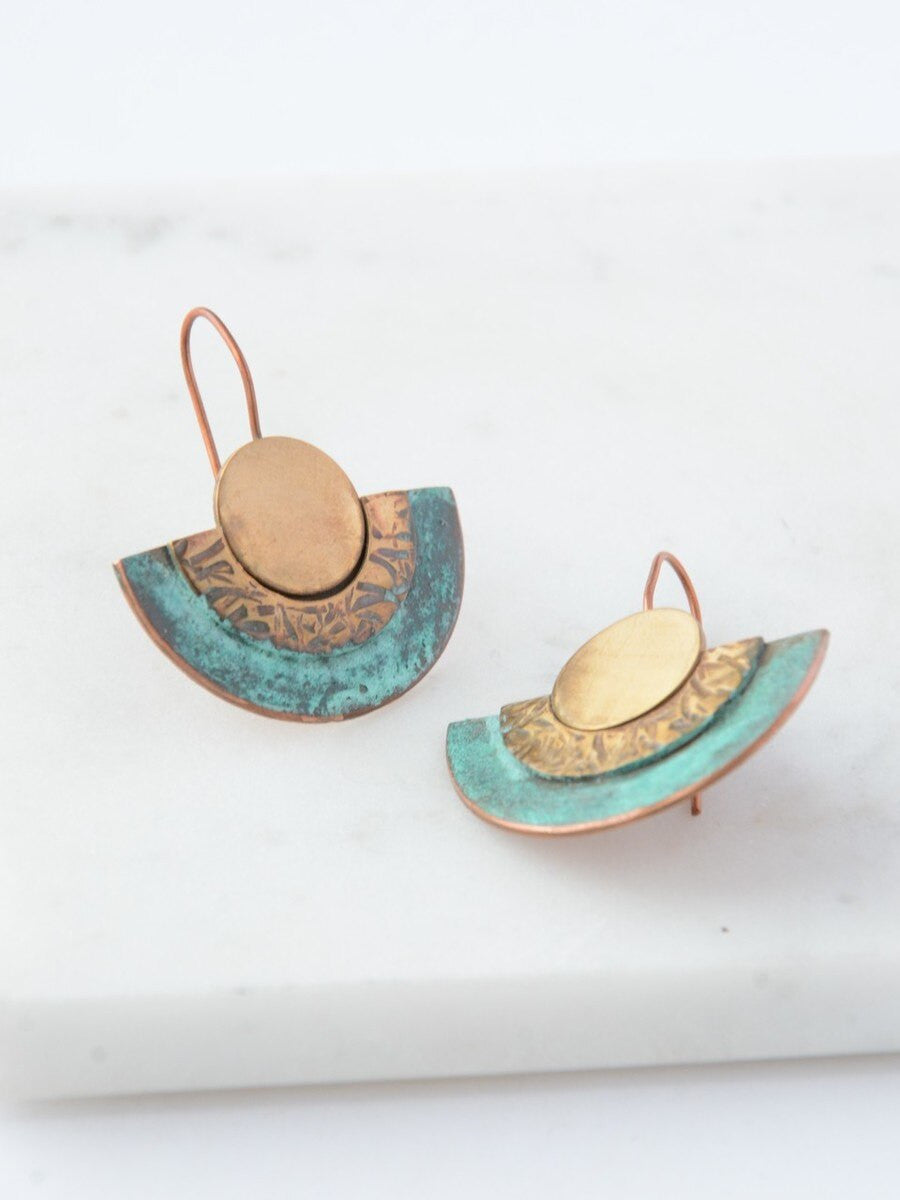 Close-up of Fair Anita copper turquoise patina southwest earrings handmade in Chile