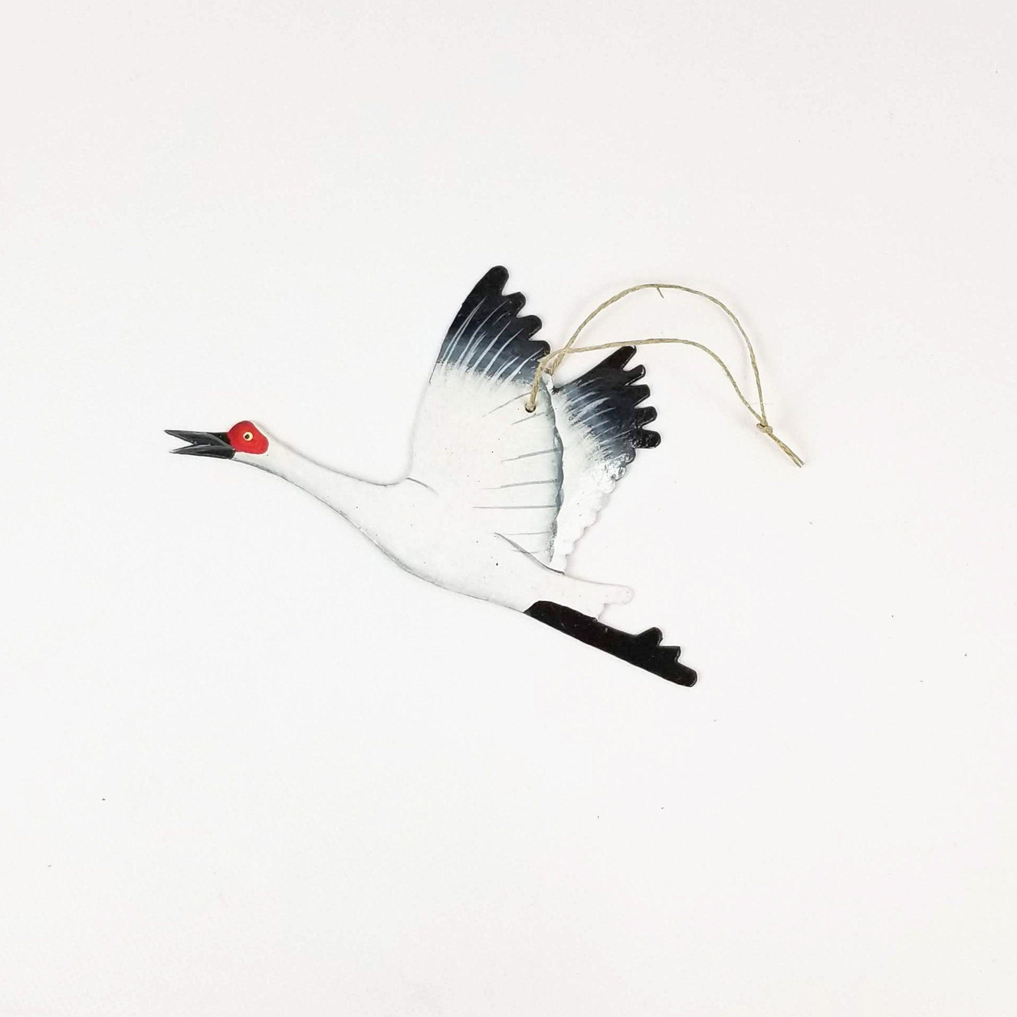 Decorative crane ornament on a white background
