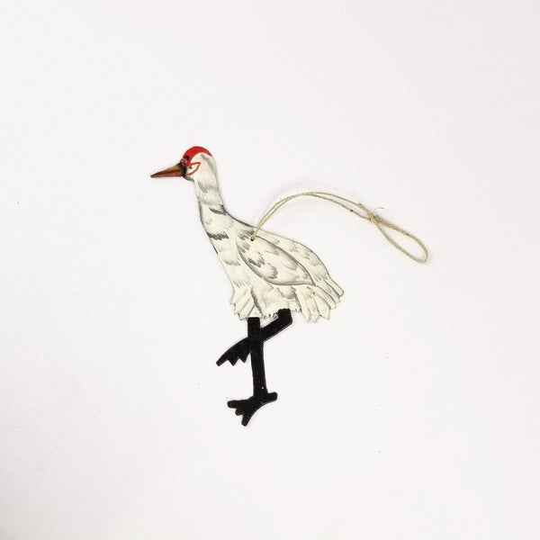 Decorative crane ornament on a white background