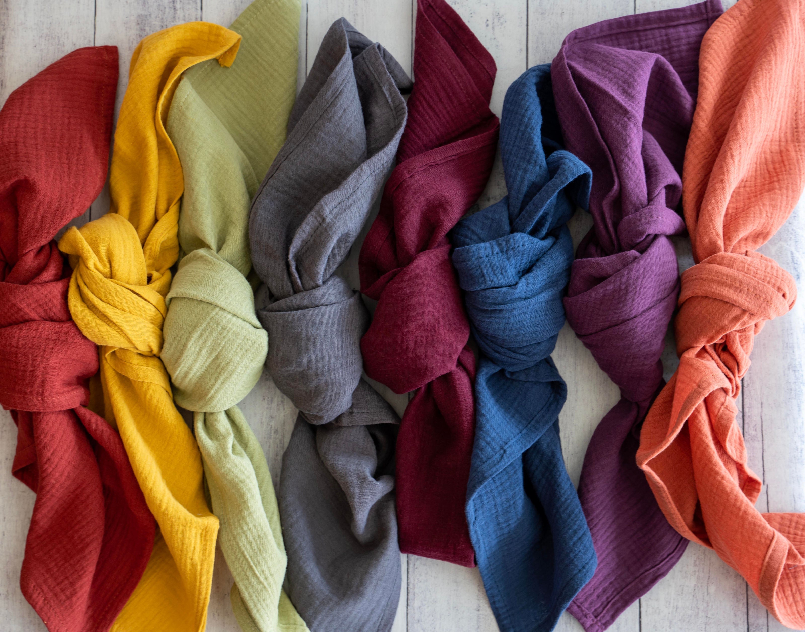 Set of four cotton crinkle cloth napkins in rainbow assorted colours by Dot and Army