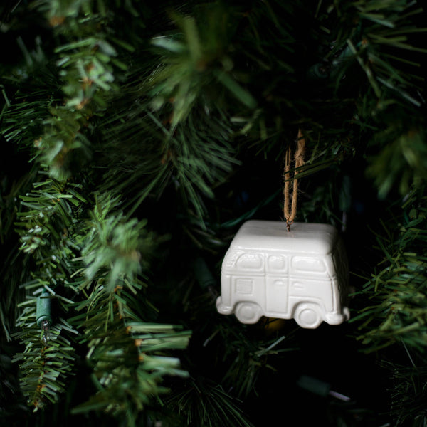 White van ornament hanging on a Christmas tree