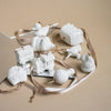 Close-up of glazed porcelain hot air balloon ornament handmade by Ukrainian artisans