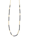 Dainty black seed bead and gold brass Morse Code Necklace on model — fair trade jewellery from India