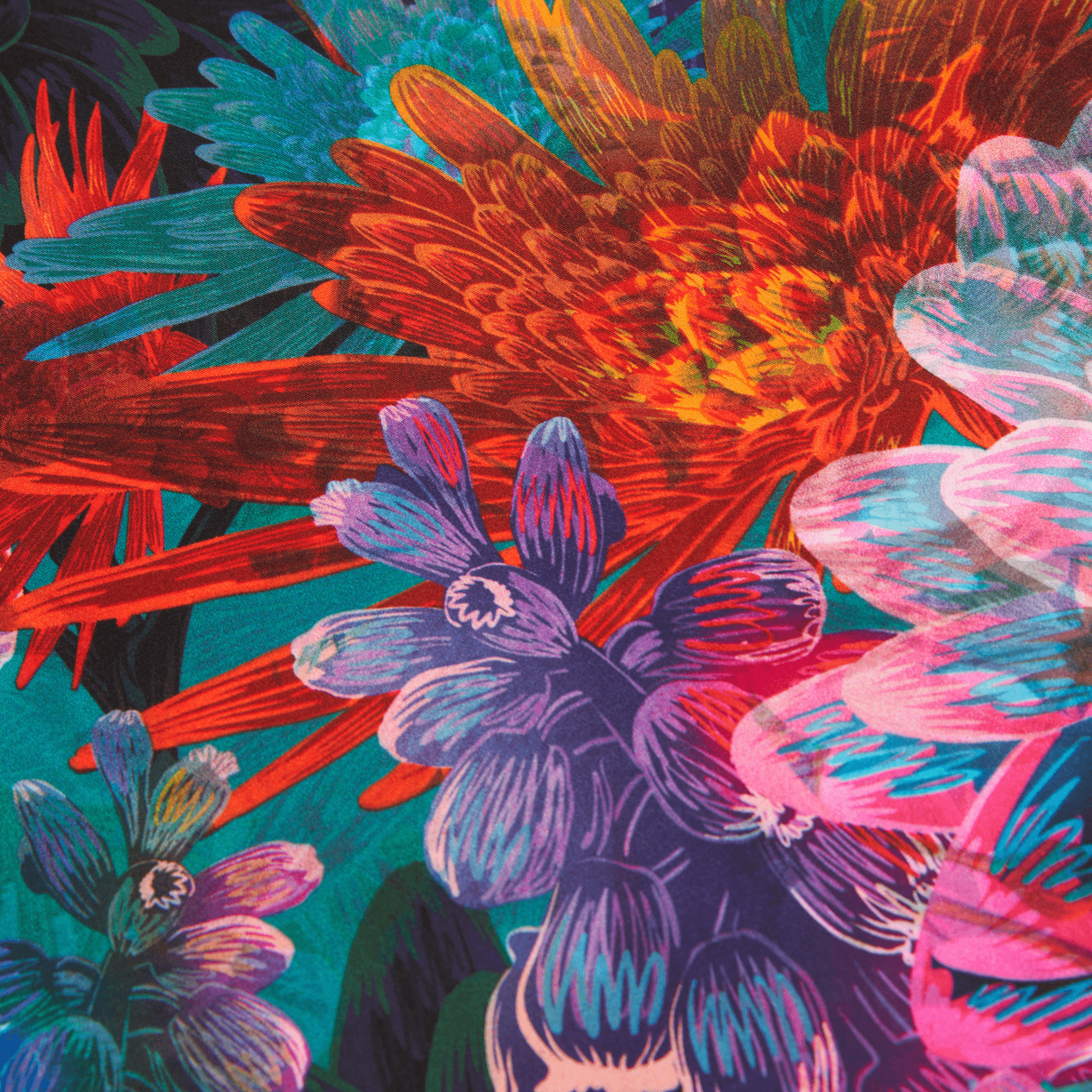Colorful floral pattern with red, blue, and pink flowers on a green background