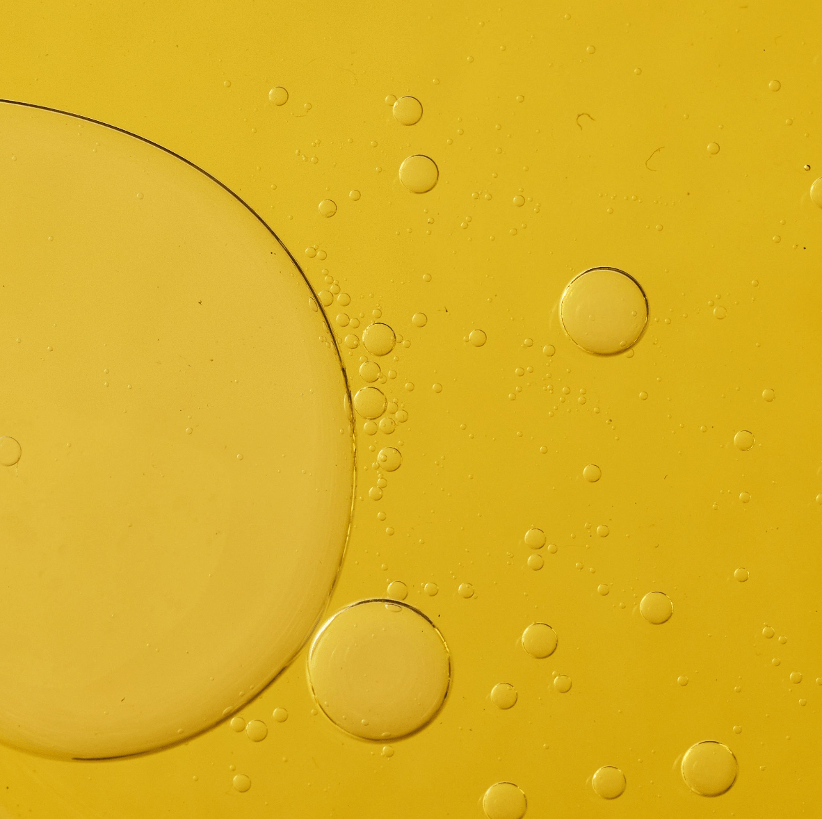 Yellow background with oil and water separation