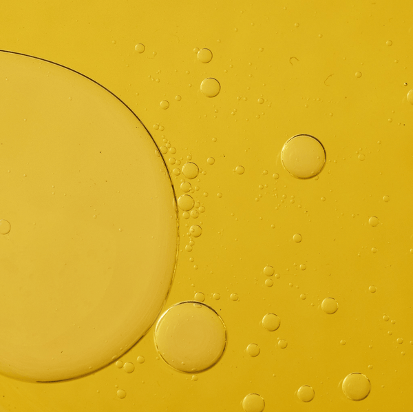Yellow background with oil and water separation