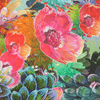 Colorful floral pattern with pink, orange, and green flowers.