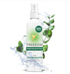 Freedom Pure Eucalyptus aromatherapy flower mist bottle with eucalyptus leaves on a white background