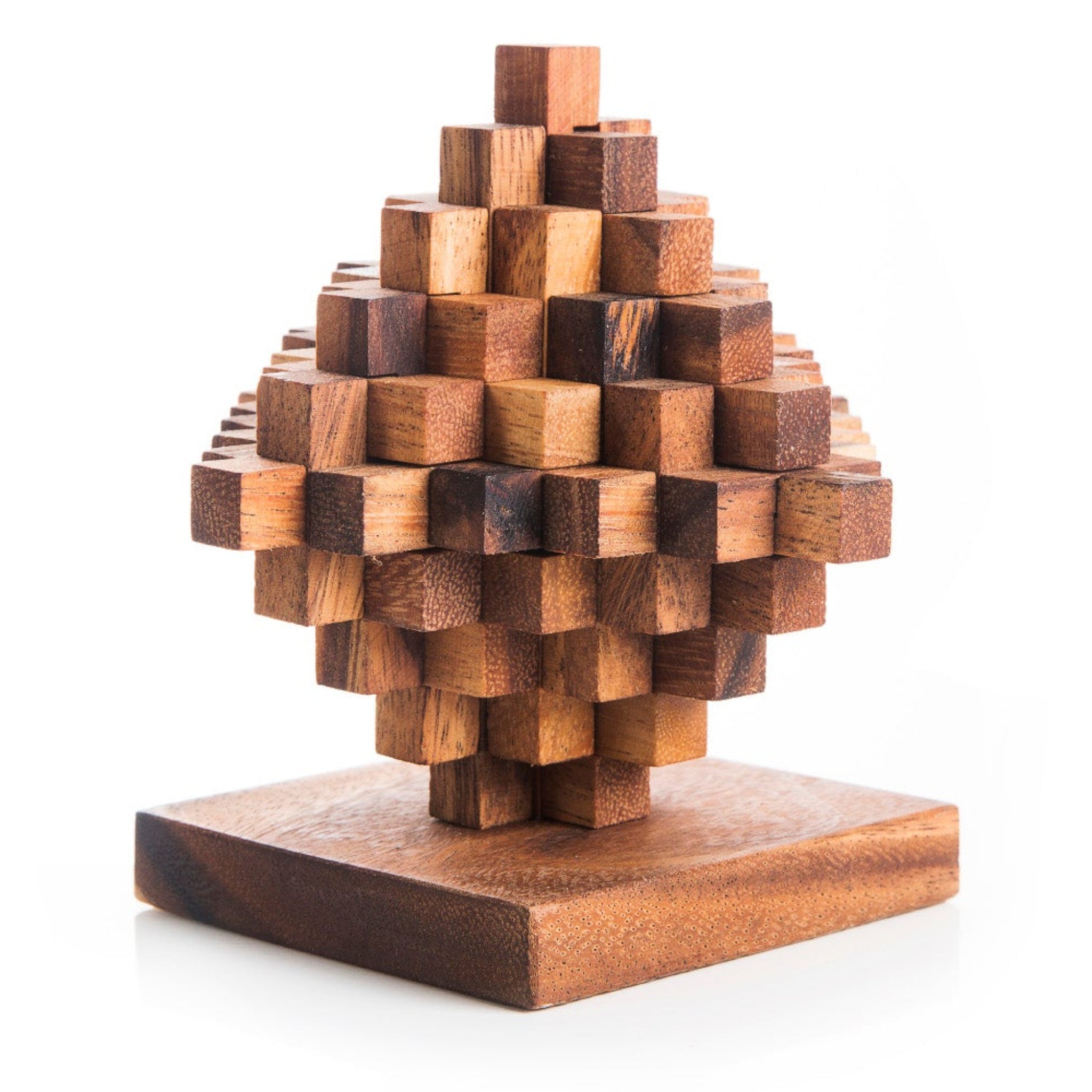 Wooden puzzle sculpture on a white background