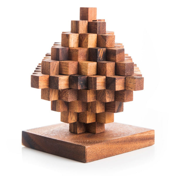 Wooden puzzle sculpture on a white background