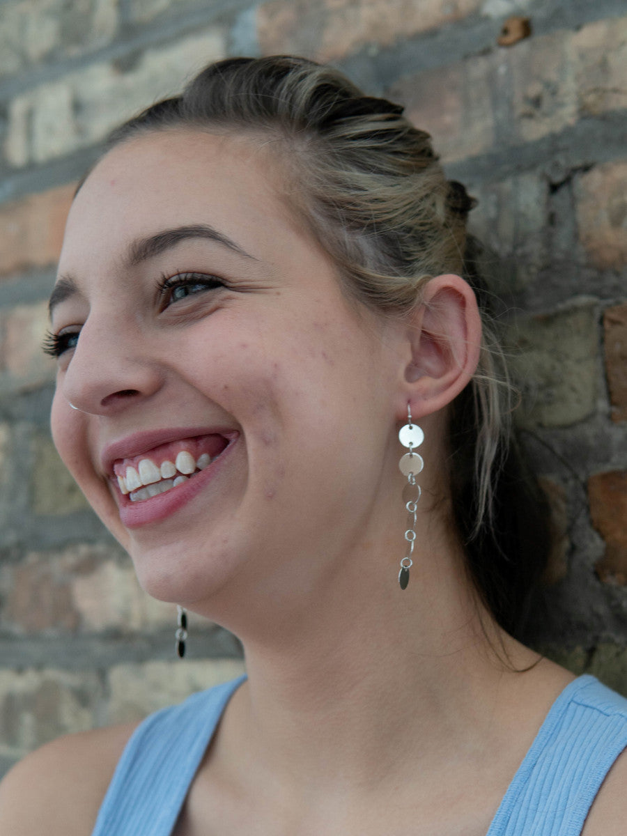 Fair Anita disc chain earrings styled on model – 3 inch long circle link earrings