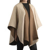 Beige and brown cape worn by a person on a white background