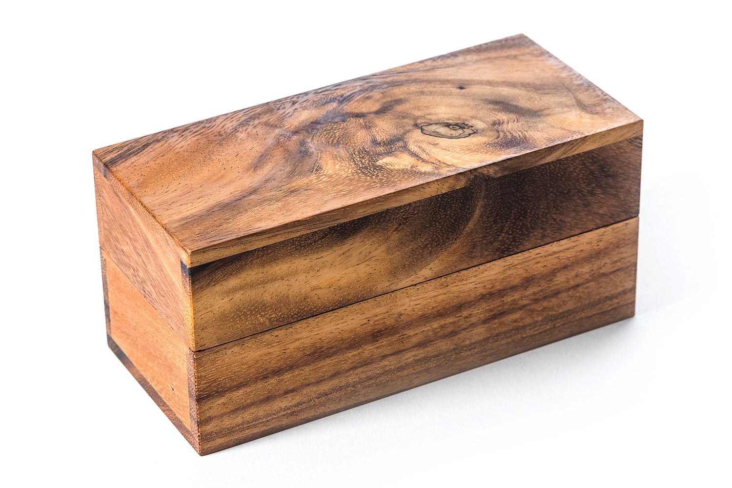 Wooden box with a natural grain pattern on a white background