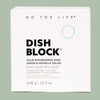 Box of No Tox Life Dish Block solid dishwashing soap on a light green background