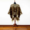 Eastwood alpaca poncho worn as an outerwear layer, showcasing its generous 58-inch width