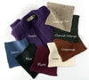 Collection of knit swatches in various colors with labels on a white background