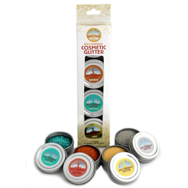 Set of eco-friendly cosmetic glitter tins with packaging on a white background