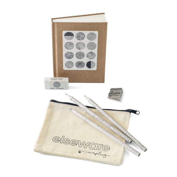 Stationery set with notebook, pens, ruler, and pouch on a white background