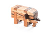 Child playing with natural wood elephant puzzle, fun kids game, New York
