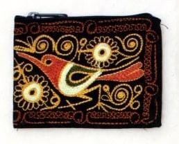 Embroidered pouch with a hummingbird design on a black background