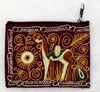 Embroidered pouch with a deer design on a brown background