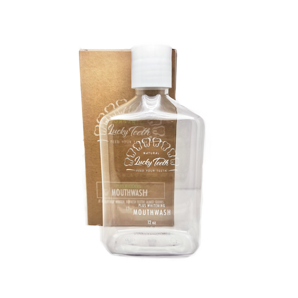 Clear mouthwash bottle with white cap and 'Lucky Teeth' branding on a white background