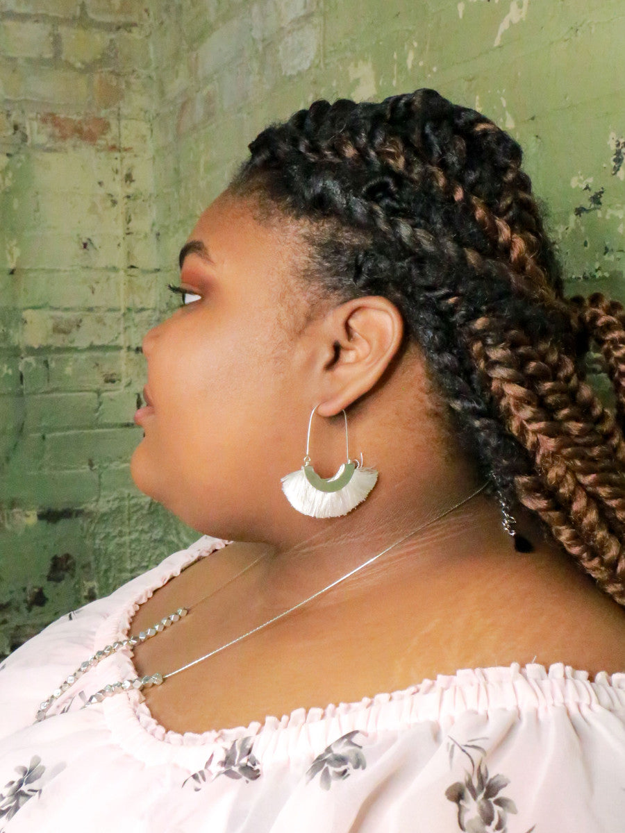 Ethically made fringe hoop earrings by Fair Anita worn as a dangle drop style