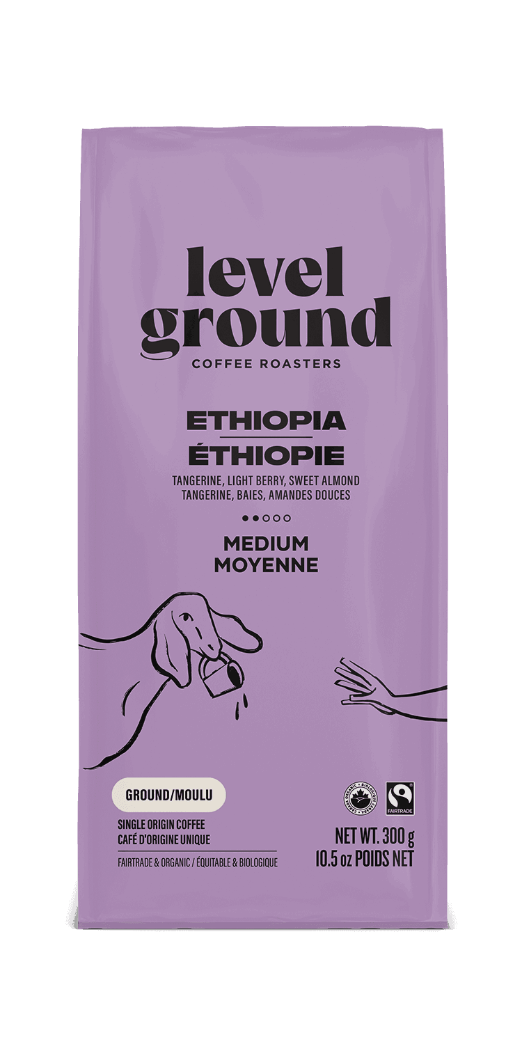 Close-up of Level Ground Ethiopian Medium Roast Coffee packaging showing tasting notes of tangerine, berry, and sweet almond